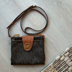 Michael Kors Dark Brown monogram Crossbody Bag with tan trim and gold hardware